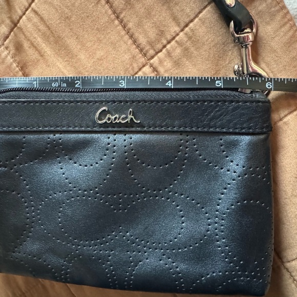 Sophisticated Coach Black Perforated Wristlet - Picture 11 of 13
